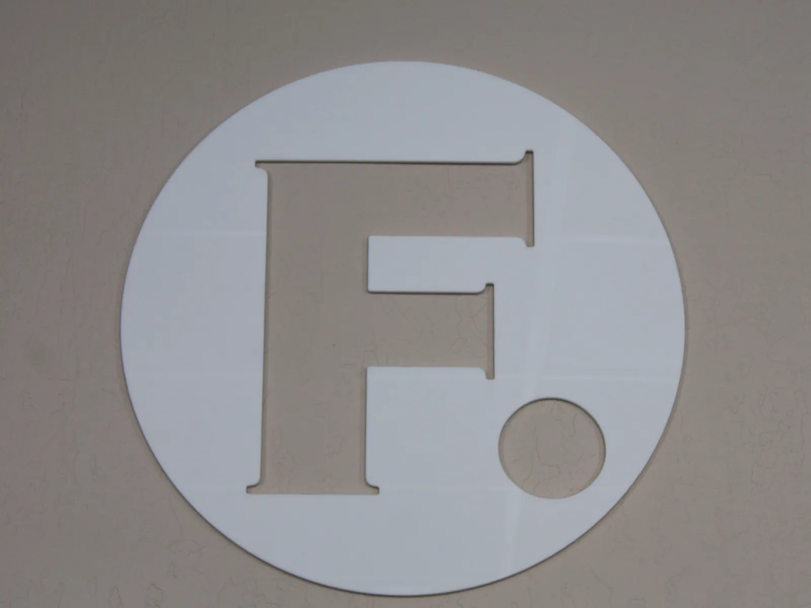 The Function's F logo on an office wall